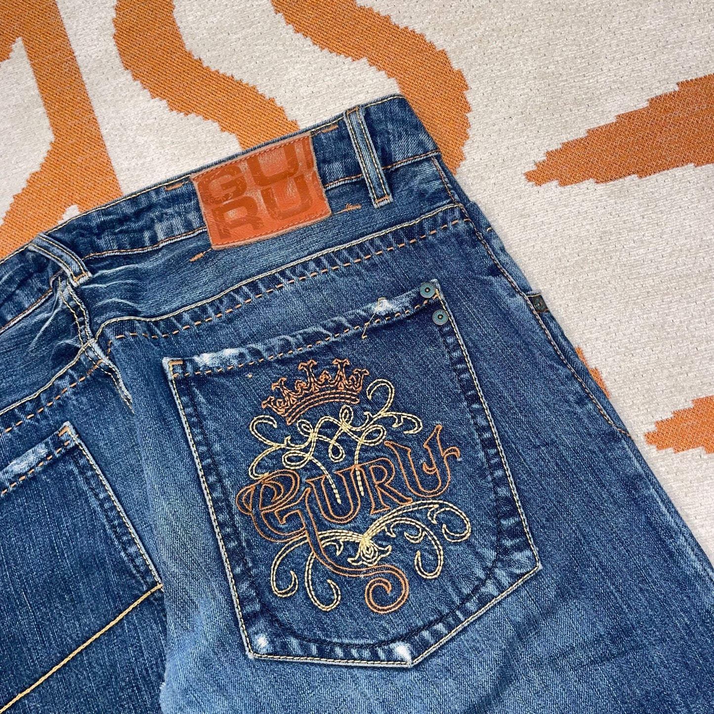 Guru 00s Embroidered Jeans