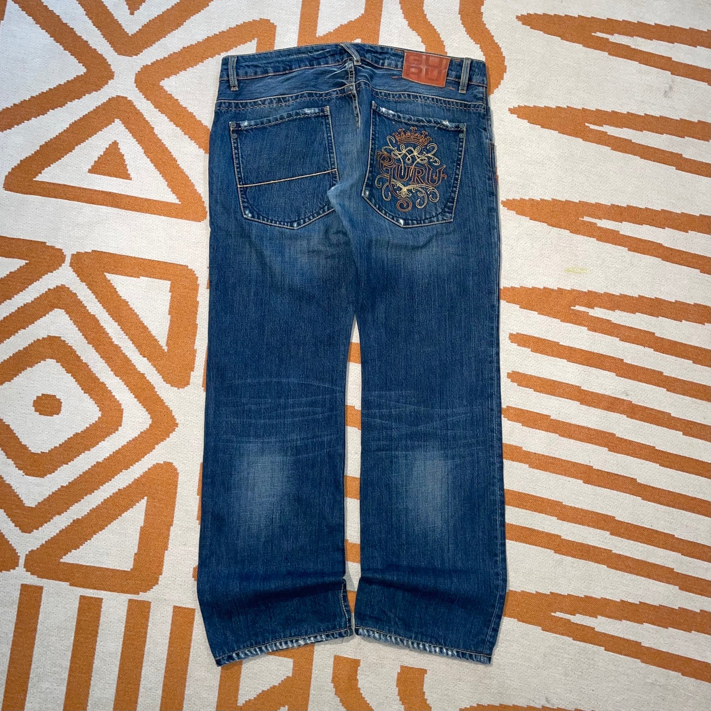 Guru 00s Embroidered Jeans