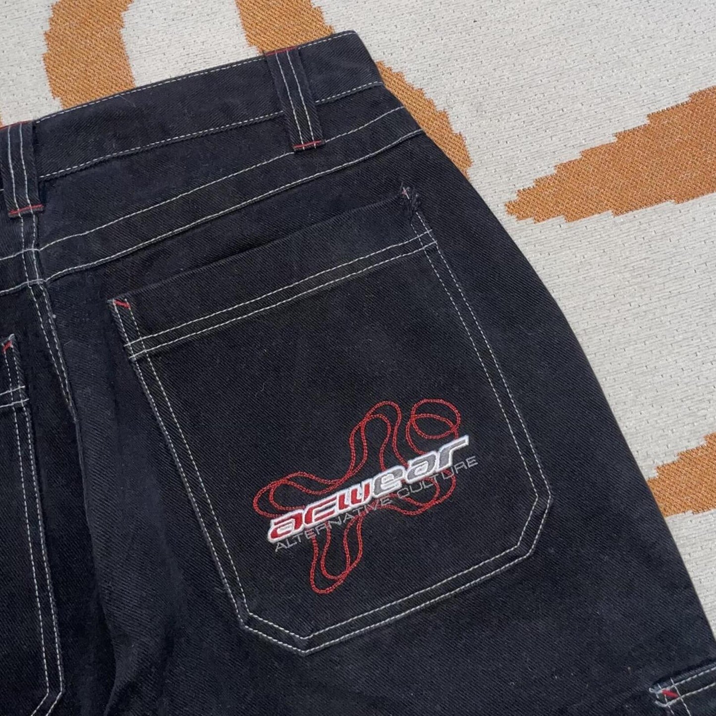 Campus 00s Embroidered ‘AC-WEAR’ Black Trousers 28x33